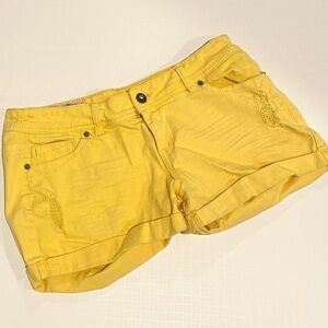 Yellow mini denim shorts